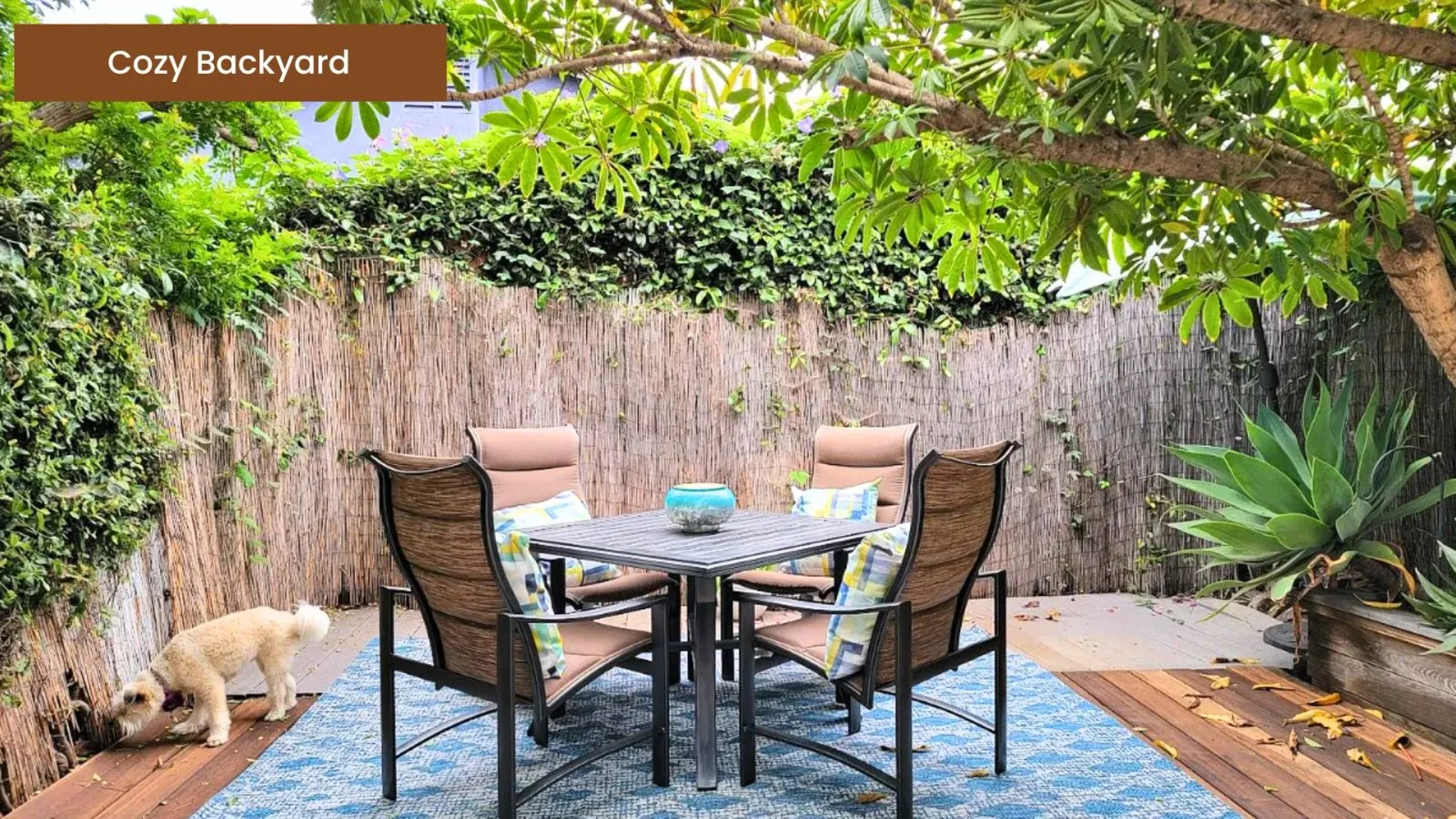 Cozy backyard dining set on a wood deck, with a small dog relaxing nearby