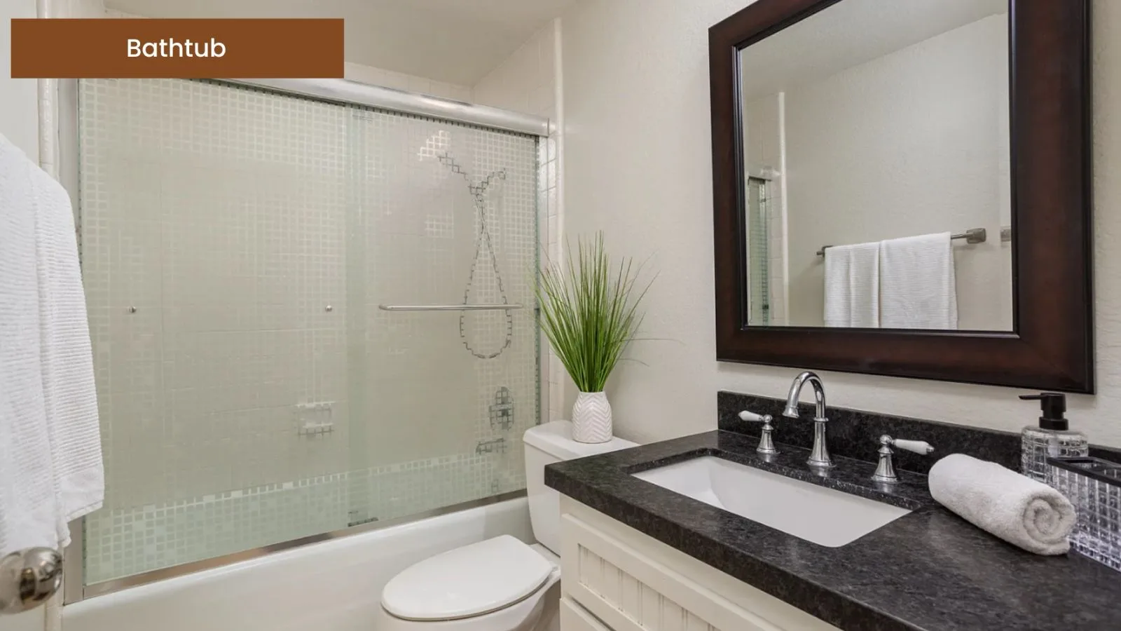Second bathroom with a tub and shower