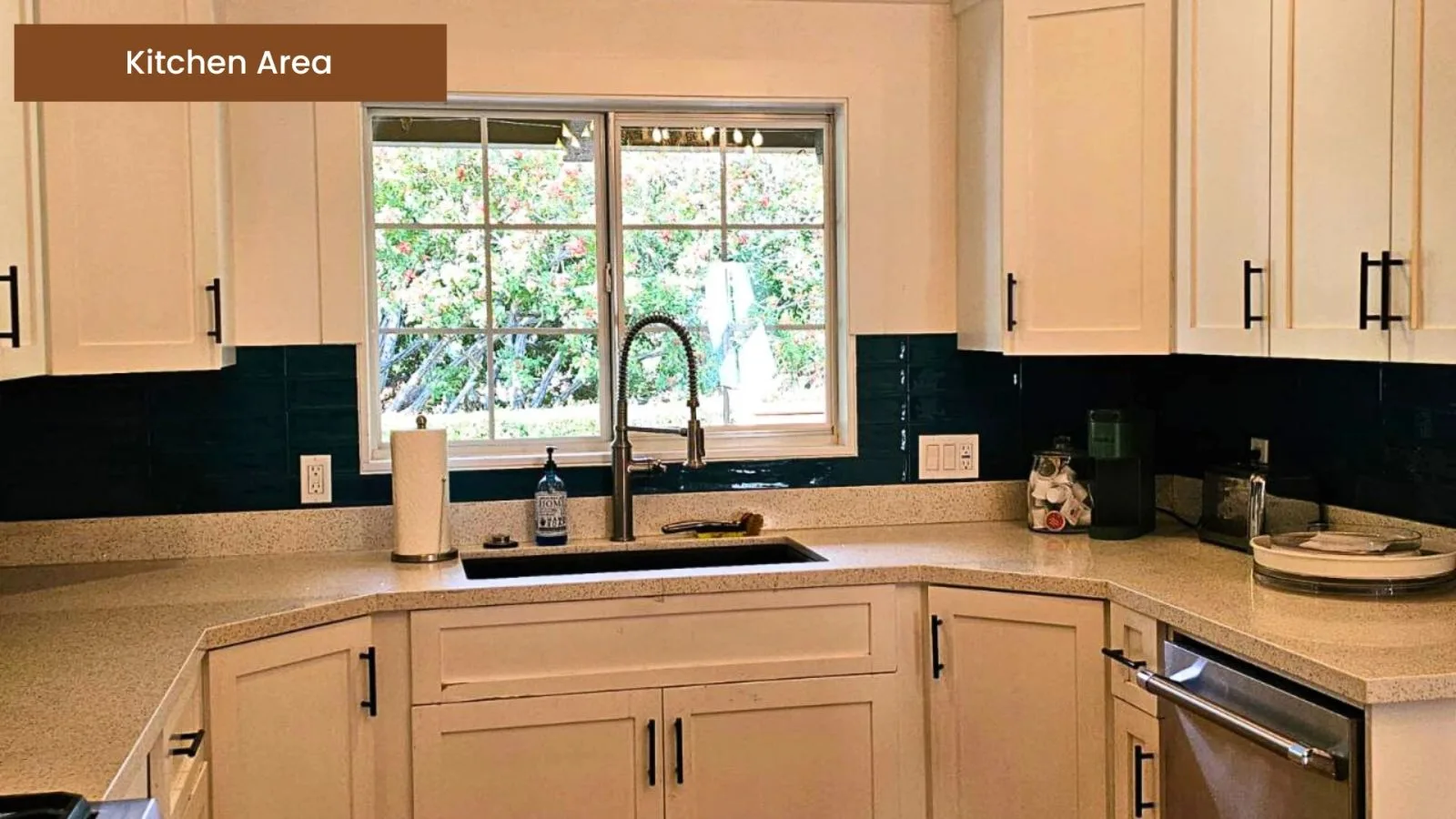 Corner kitchen window over the sink with garden views